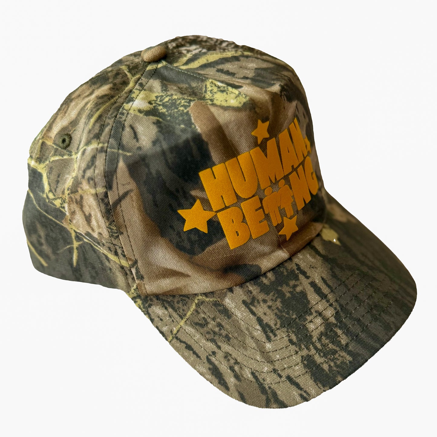 HUMAN BEING Soft Camo/ Yellow SNAPBACK